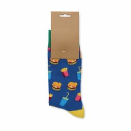 Colourful blue socks featuring a burger and fries pattern, with a green and yellow trim, packaged with a cardboard tag.