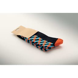 A pair of socks with a black base and a bright orange toe, featuring a blue and orange geometric pattern.