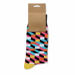 A pair of colourful socks featuring a geometric pattern in pink, blue, yellow, and black, still attached to a tag.
