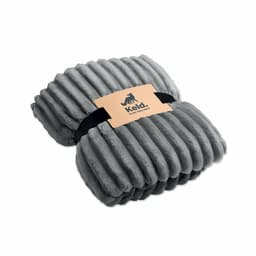 A folded grey blanket with a textured design, secured with a black band and a tag.
