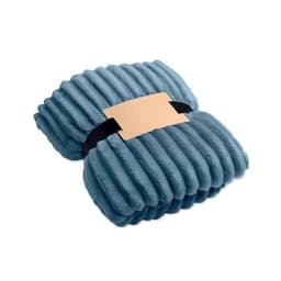 A plush, blue blanket features a ribbed texture and is secured with a black strap and cardboard tag.