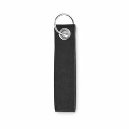 A keychain tag in black fabric with a metal ring for attachment. Simple and minimalist design.