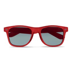 A pair of red sunglasses with grey tinted lenses and a sleek design.