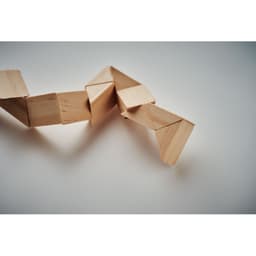 A wooden puzzle toy featuring interlocking triangular and rectangular pieces in a light timber finish.
