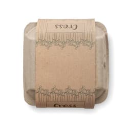 A packaging box for "Cress" featuring a light brown paper wrap with green illustrations and branding.