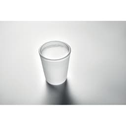 A drink bottle with a white, cylindrical design, set against a reflective silver surface.