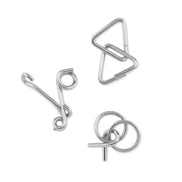 A set of three silver clips in different shapes, including a safety pin, a looped design, and a twisted ring.