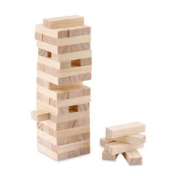 A wooden stacking game with a tall tower of blocks and several loose blocks beside it. The blocks are light in colour.