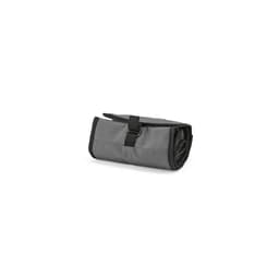 A rolled-up grey cooler bag with a roll top and a metal G hook for securing. The bag features a logo.