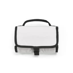 A cooler bag in white with black trim, featuring a roll top and a metal G hook. It has a handle for easy carrying.