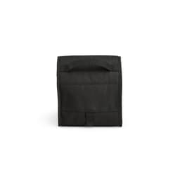 A black cooler with a roll top design, featuring a sturdy handle and a metal G hook. It has a simple, clean appearance.