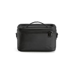 A black cooler bag with a handle and thermo-injected zippers. It features a sleek and compact design.