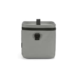 A grey cooler with a square shape, featuring thermo-injected zippers and a front loop for attachment.