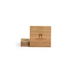 Acacia wood coasters in a natural brown hue, featuring an engraved logo, set of four.