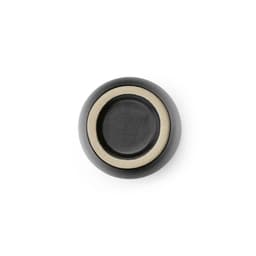 A ceramic espresso mug with a matte black finish and a light-coloured interior, featuring a circular base.