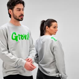 A grey unisex crew neck sweatshirt made from organic cotton and rPET. Features a green logo and has one on the back.