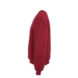 A red oversized sweatshirt with a side view, featuring a ribbed hem and cuffs. It has a logo on it.