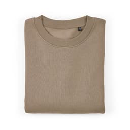 A folded oversized sweatshirt in a muted beige colour, featuring a ribbed neckline and a logo tag.