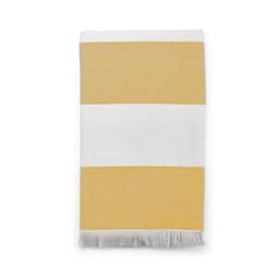 A striped towel in pale yellow and white, featuring a fringed edge, made of cotton and manufactured in Portugal.