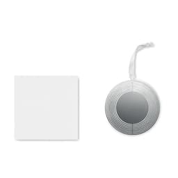 A silver circular mirror with a striped pattern beside a blank white card. The mirror has a hanging ribbon.