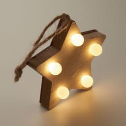 A star-shaped wooden decoration with five soft white lights and a twine hanging strap.