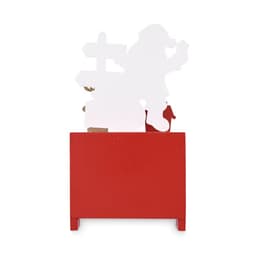 A red display stand featuring a white cut-out design of a Santa figure holding a gift, with a signpost behind.