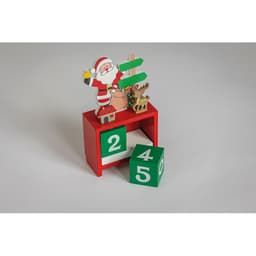 A festive red display stand featuring green blocks with numbers and a Santa decoration on top.