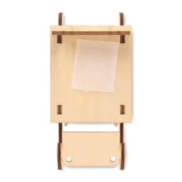 A wooden sleigh with a light brown finish, featuring a simple design and a slot for a note or message.