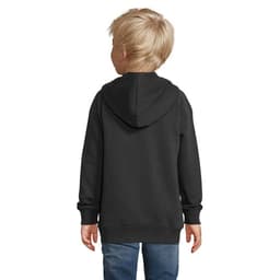 A child wearing a black hooded sweatshirt, viewed from the back, with light-coloured hair and blue jeans.