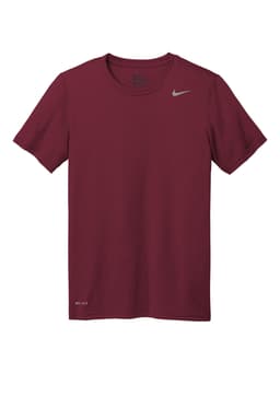 A maroon Nike Team rLegend Tee with a logo on the chest, featuring a classic short-sleeve design.