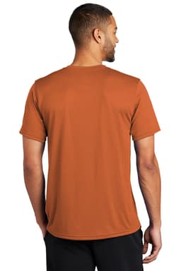 A man wearing an orange T-shirt, viewed from the back, featuring a logo on the upper back.