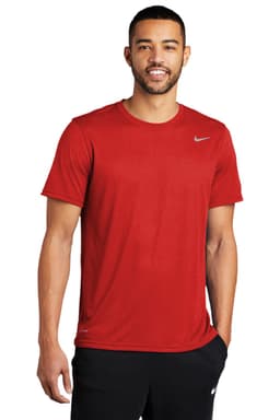A red Nike team rLegend Tee is displayed on a model, featuring a simple design with a logo.