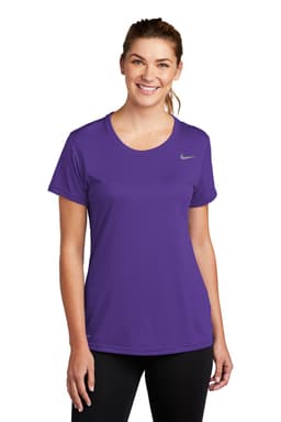 A purple Nike ladies' t-shirt featuring short sleeves and a brand logo on the chest.