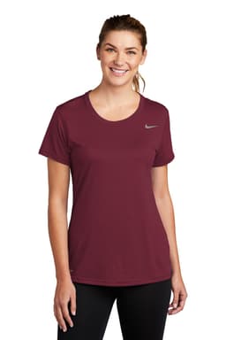 A maroon women's t-shirt with short sleeves, featuring a logo on the chest.