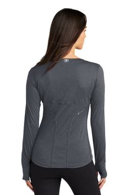 A long sleeve crew shirt in grey with a logo, featuring a fitted design and back detailing.