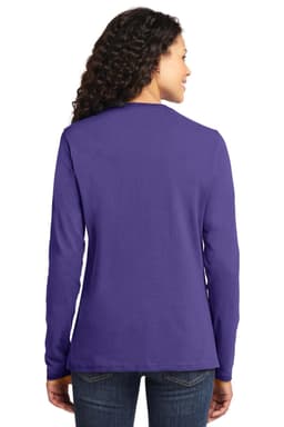 A woman is wearing a long sleeve, purple cotton tee, viewed from the back. The shirt features a logo.