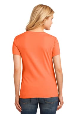 A woman is wearing an orange Port & Company Ladies Core Cotton V-Neck Tee from the back, with jeans.