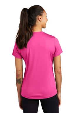 A pink Sport-Tek Ladies PosiCharge Competitor Tee, featuring a logo, displayed from the back on a model.
