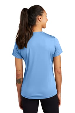 A woman wearing a blue Sport-Tek Ladies PosiCharge Competitor Tee, viewed from the back. The shirt has a logo.