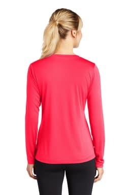 A woman wearing a vibrant pink long sleeve V-neck tee, viewed from the back. The shirt has a logo.