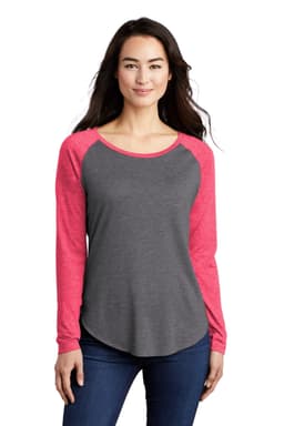 A long sleeve tri-blend tee featuring a grey body and bright pink raglan sleeves, designed for women's casual wear.