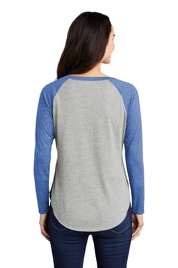 A long sleeve tri-blend raglan tee with grey body and blue sleeves, featuring a rounded hem and a logo.
