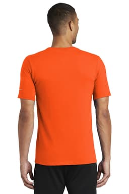 An orange Nike Dri-FIT cotton/poly T-shirt displayed from the back, featuring a logo on the sleeve.
