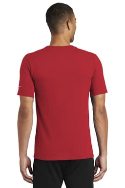 A red Nike Dri-FIT Cotton/Poly Tee featuring a logo, viewed from the back on a model.
