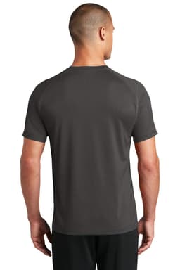 A grey OGIO ENDURANCE Level Mesh Tee displayed from the back, featuring a logo on the garment.