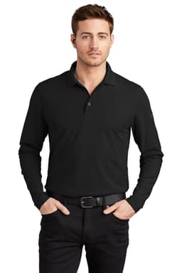 A black long sleeve shirt with a collar, featuring a logo, worn by a model with cropped hair and a belt.