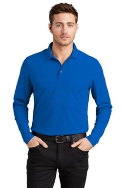 A long sleeve blue shirt with a collar, modelled by a man, features a logo on the chest.
