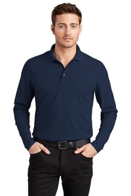 A navy long sleeve polo shirt with a collar and a logo, displayed by a model in black trousers.