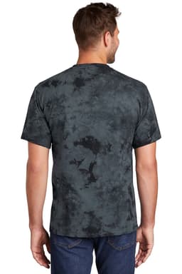 A man wearing a Port & Company tie-dye T-shirt in shades of black and grey, viewed from the back.