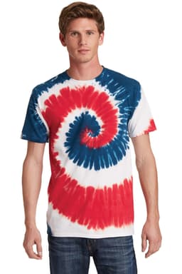A man wearing a tie-dye T-shirt featuring red, white, and blue spiral patterns. The shirt has a logo.
